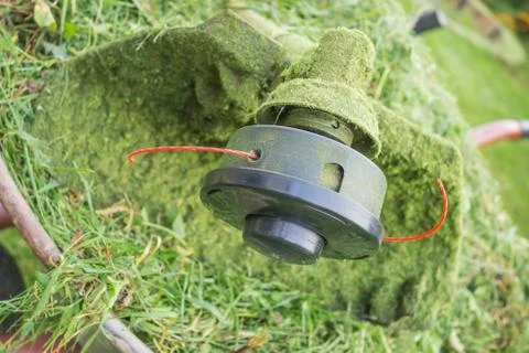 Spool Trimmer  and grass Stock Photos