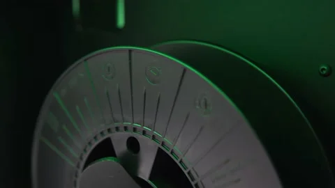 Spooling of a material onto a black spool Stock Footage 140737936