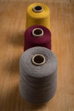 Spools of Color Thread Aligned Vertically Stock Photos