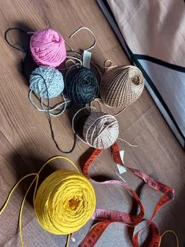 Spools of colorful knitting threads Stock Photos