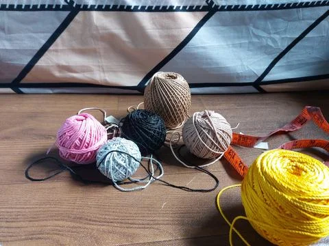 Spools of colorful knitting threads Stock Photos