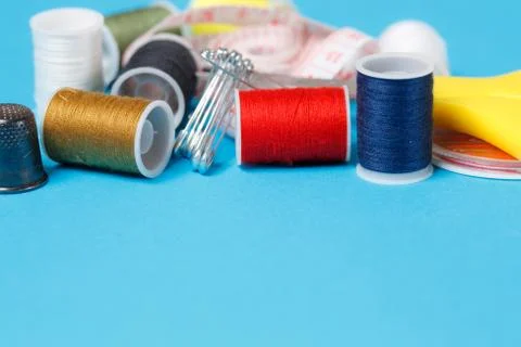 Spools of Colorful Thread on Neutral Background Stock Photos
