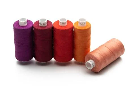 Spools of colours threads isolated on white background Stock Photos