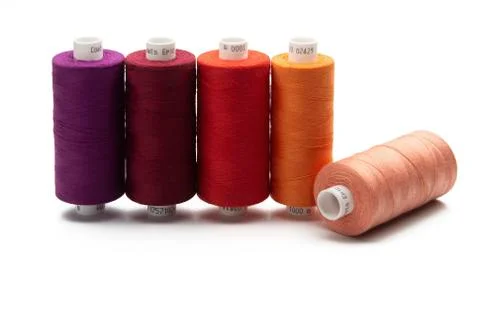 Spools of colours threads isolated on white background Stock Photos