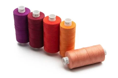 Spools of colours threads isolated on white background Stock Photos