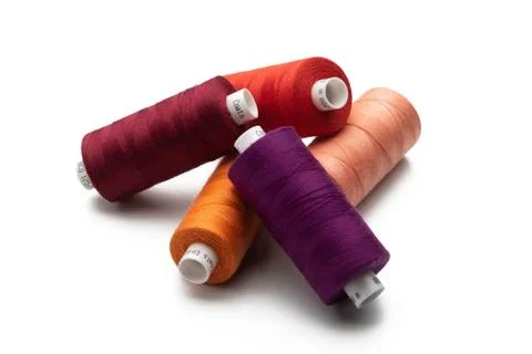 Spools of colours threads isolated on white background Stock Photos