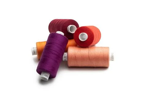 Spools of colours threads isolated on white background Stock Photos
