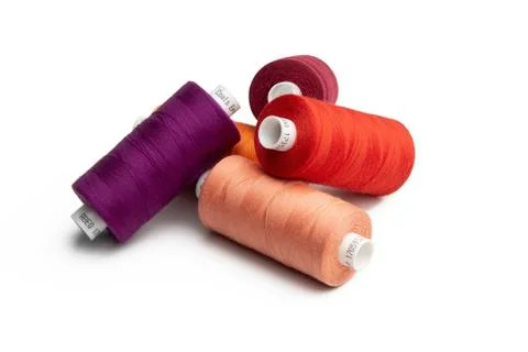 Spools of colours threads isolated on white background Stock Photos