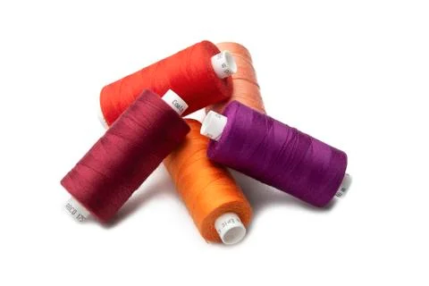 Spools of colours threads isolated on white background Stock Photos