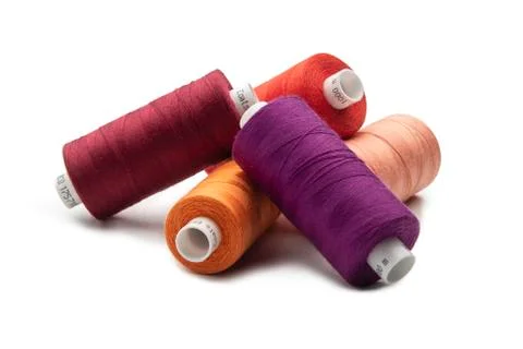 Spools of colours threads isolated on white background Stock Photos