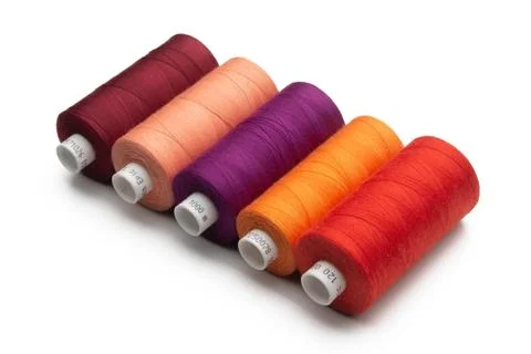 Spools of colours threads isolated on white background Stock Photos