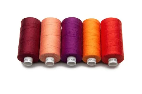 Spools of colours threads isolated on white background Stock Photos