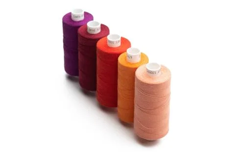 Spools of colours threads isolated on white background Stock Photos