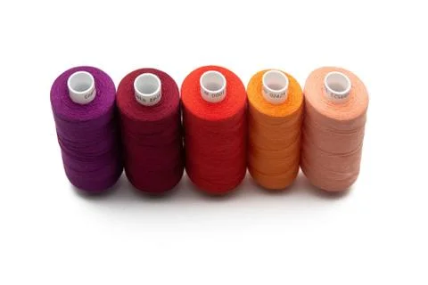 Spools of colours threads isolated on white background Stock Photos