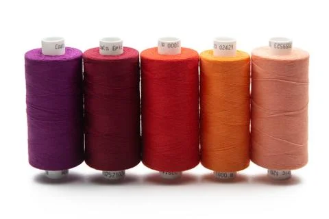 Spools of colours threads isolated on white background Stock Photos