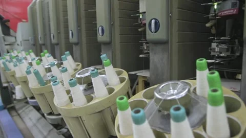Spools Of Cotton Thread Processed By A Automated Spinning Machine, Stock Footage 246505368