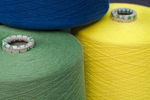 Spools of multi-coloured wool threads Stock Photos