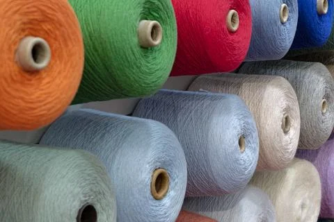 Spools of multi-coloured wool threads Stock Photos