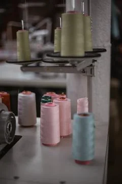 Spools of thread and needle Stock Photos