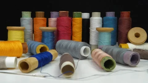 Spools of thread of different colors Stock Footage 315800000
