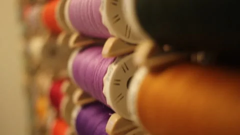 Spools of thread of different colors Stock Footage 324682112