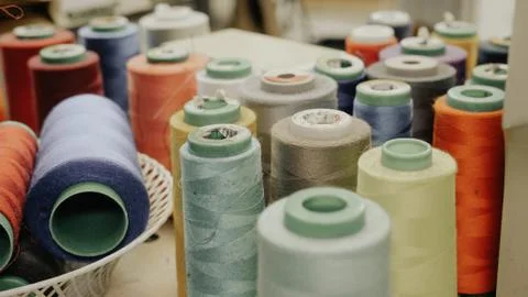 Spools of thread in a garment factory Stock Photos