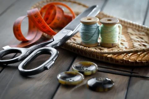 Spools of thread, needles Stock Photos