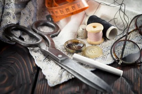 Spools of thread, needles Stock Photos