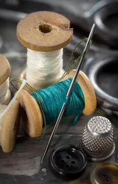 Spools of thread, needles Stock Photos