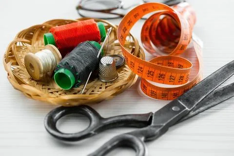 Spools of thread, needles Stock Photos