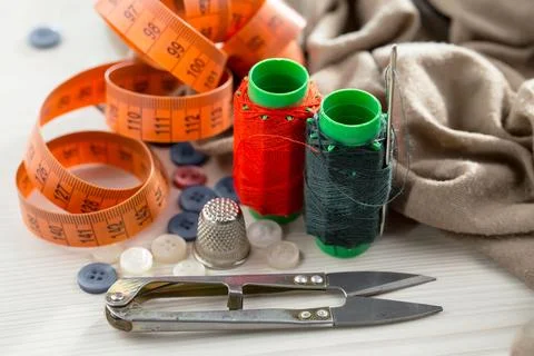 Spools of thread, needles Stock Photos