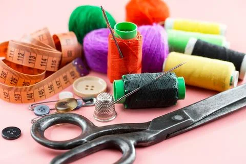 Spools of thread, needles Stock Photos