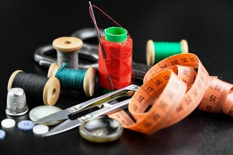 Spools of thread, needles Stock Photos