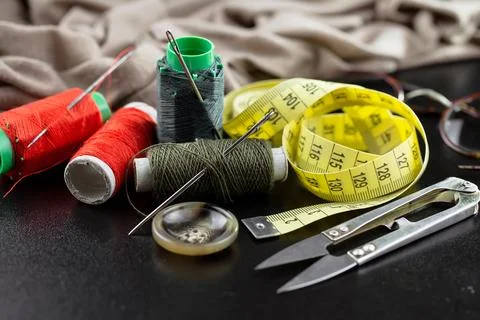 Spools of thread, needles Stock Photos