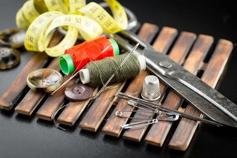 Spools of thread, needles Stock Photos