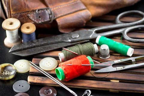 Spools of thread, needles Stock Photos