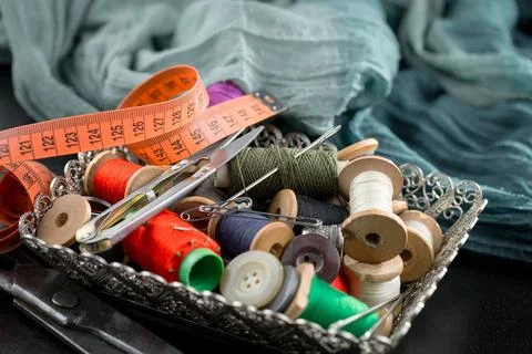 Spools of thread, needles Stock Photos