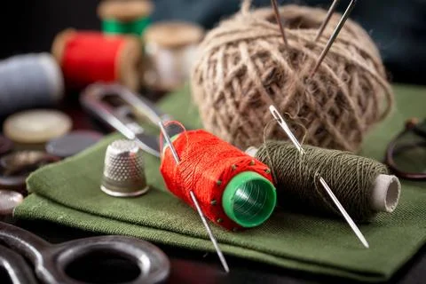 Spools of thread, needles Stock Photos