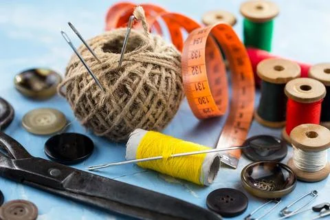 Spools of thread, needles Stock Photos