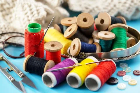 Spools of thread, needles Stock Photos