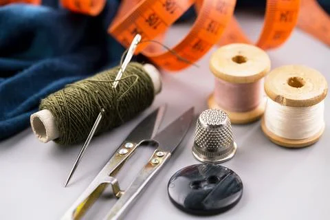 Spools of thread, needles Stock Photos