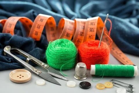 Spools of thread, needles Stock Photos