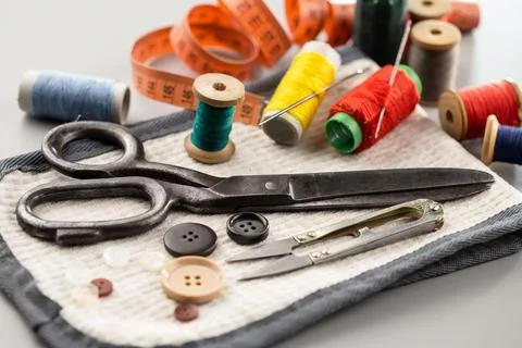 Spools of thread, needles Stock Photos