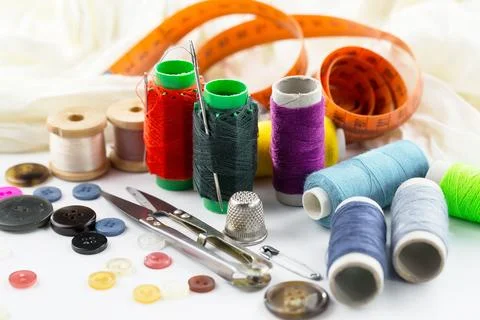 Spools of thread, needles Stock Photos