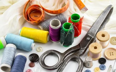 Spools of thread, needles Stock Photos