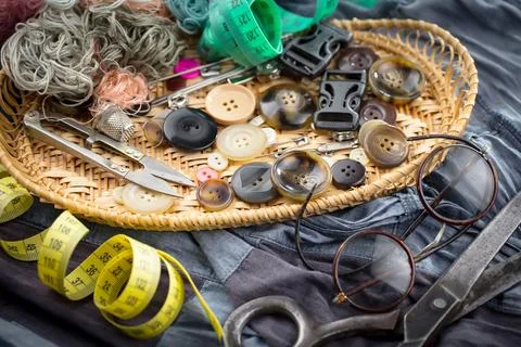 Spools of thread, needles Stock Photos