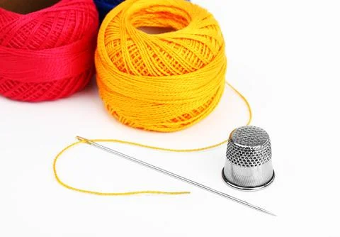 Spools of thread, needles Stock Photos