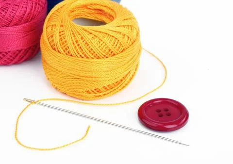 Spools of thread, needles Stock Photos