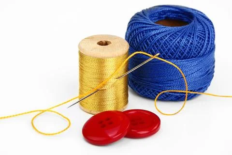 Spools of thread, needles Stock Photos