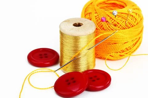 Spools of thread, needles Stock Photos